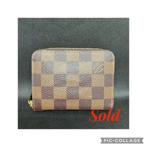 Authentic Lv zippy coin purse in Damier Ebene canvas: